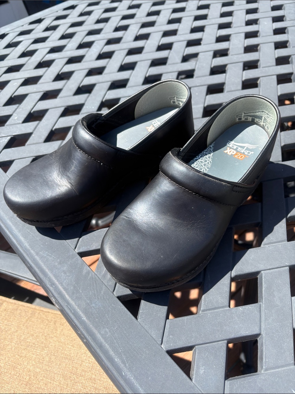 Dansko Black Waterproof Leather Slip-On Clogs